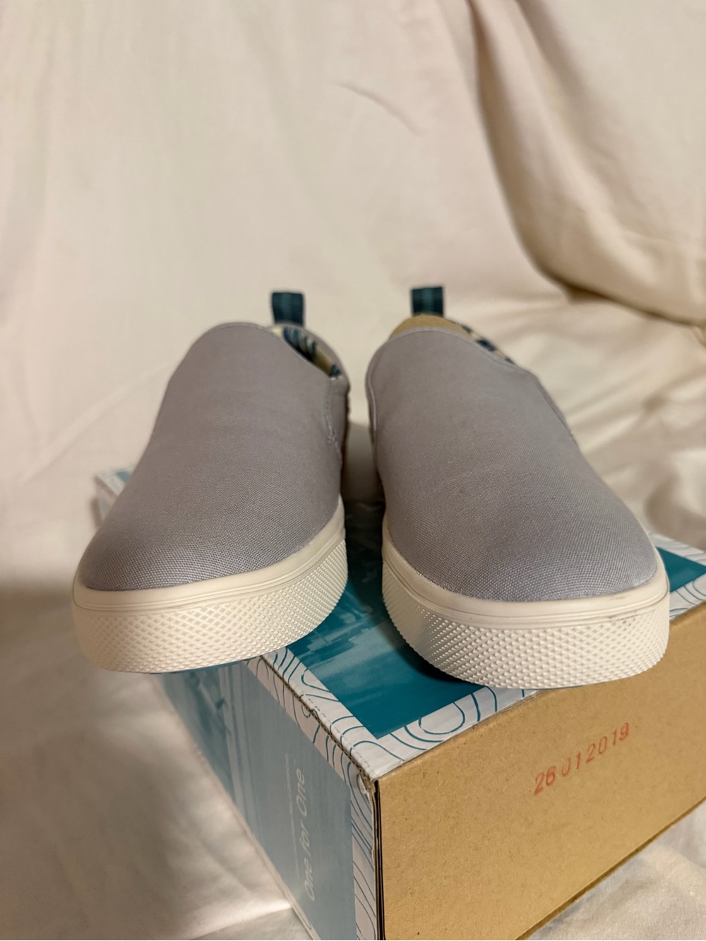 Toms Women’s Slip-On Sneakers in Light Gray and Cream Sole